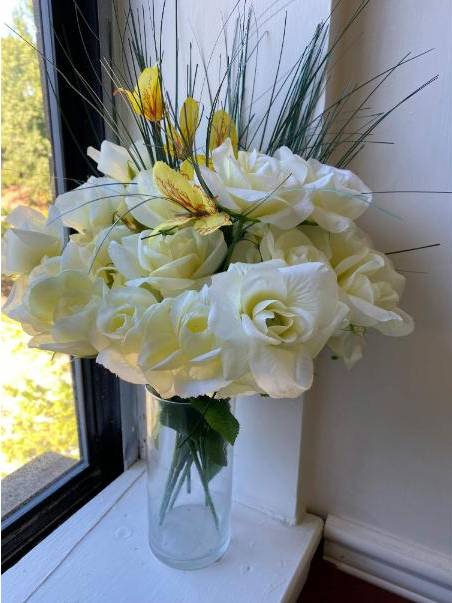 Native flowers arrangement on wooden table